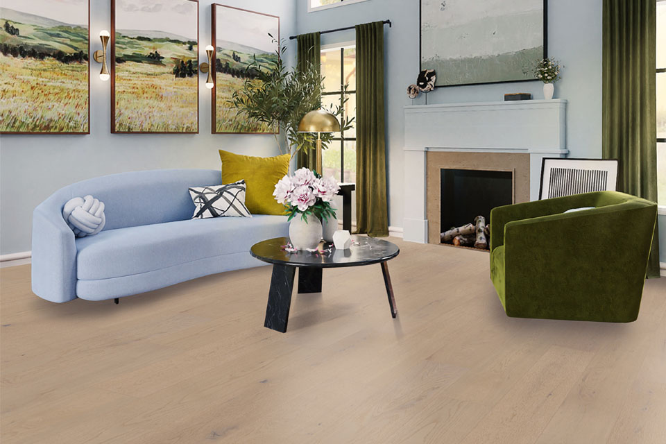 blue couch with green chair green drapes and wood flooring